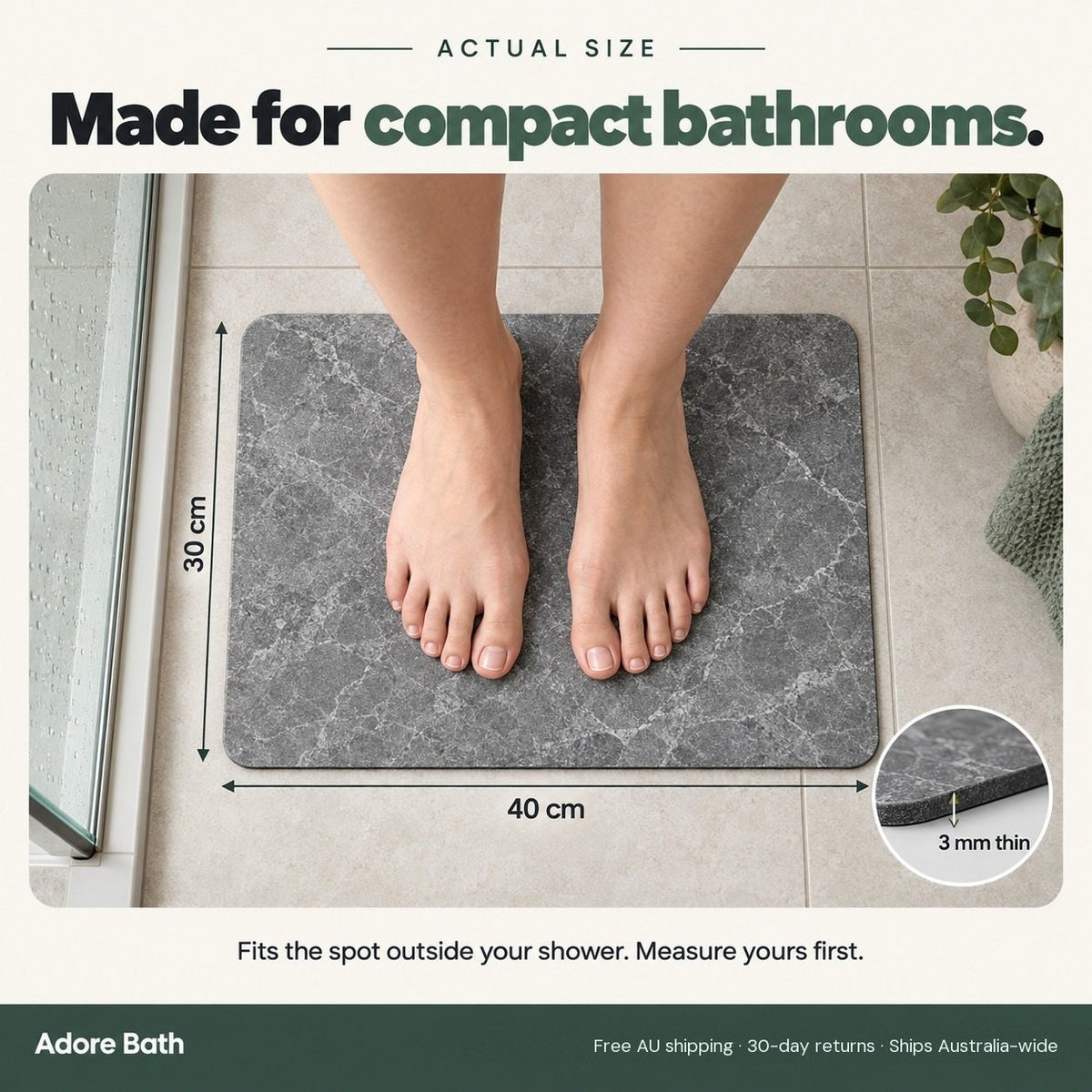 Adult feet on the 30 x 40 cm marble-grey bath mat showing its actual size