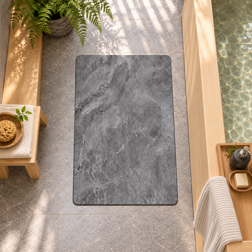 Vue du dessus du tapis de bain gris